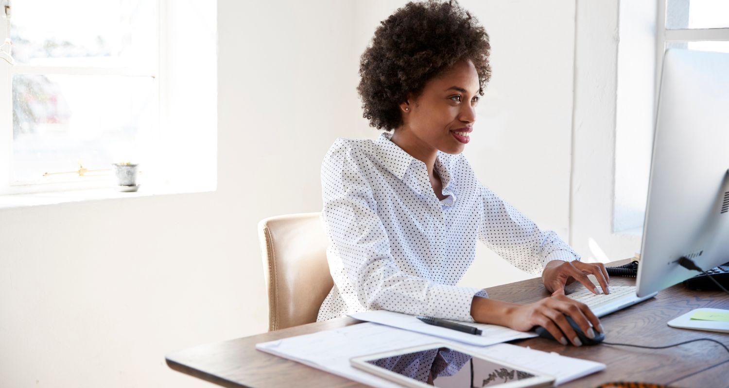 woman working at computer, bluetent