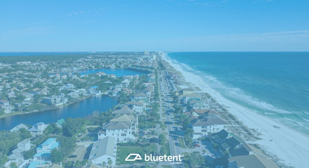 Beach front property with lots of houses.